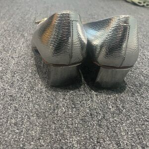 Roger Vivier silver shoes with silver buckle